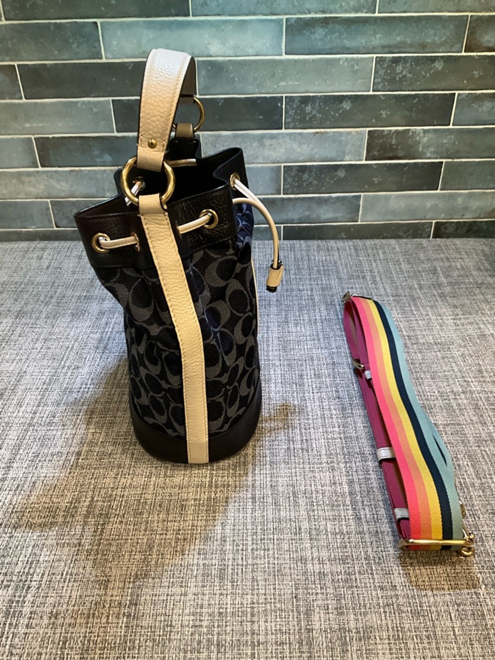 Coach Dempsey Navy Signature Bucket Bag with Tan Accents and Rainbow Strap - Picture 8 of 12